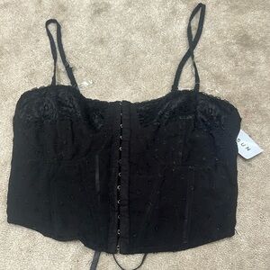 Cropped black tank top size xs never worn before with tags